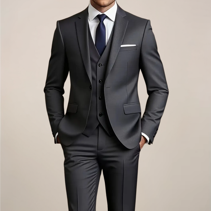 Men's dark grey slim fit 3-piece suit, perfect for formal events, weddings, or business. Tailored and elegant.