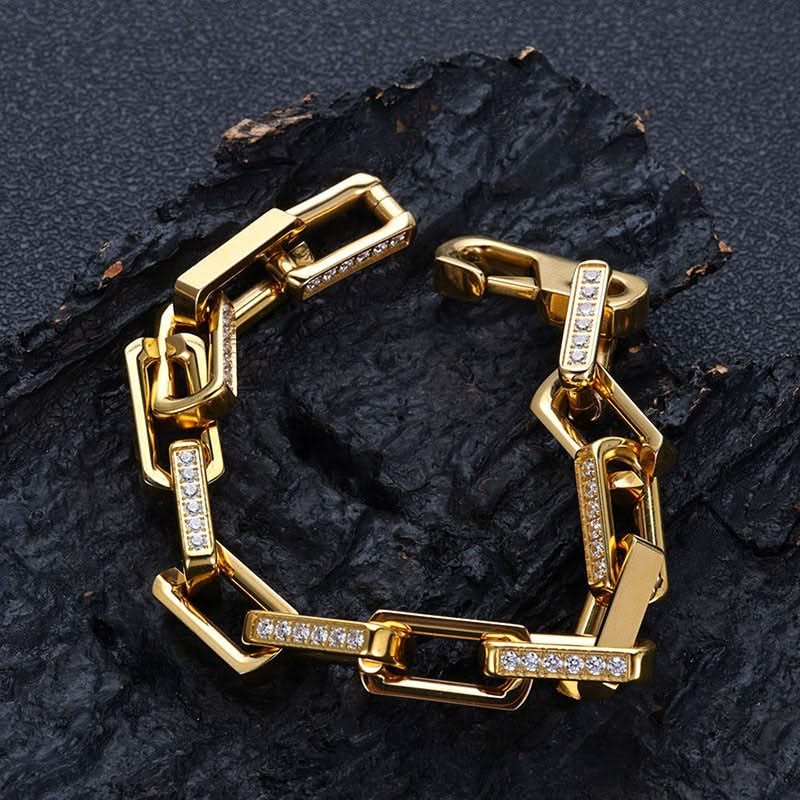 Luxury men's gold chainlink bracelet, a sparkling statement piece with embedded zirconia stones.