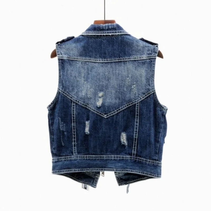 Black distressed denim moto vest for men, with an asymmetric zipper and adjustable waist belt.