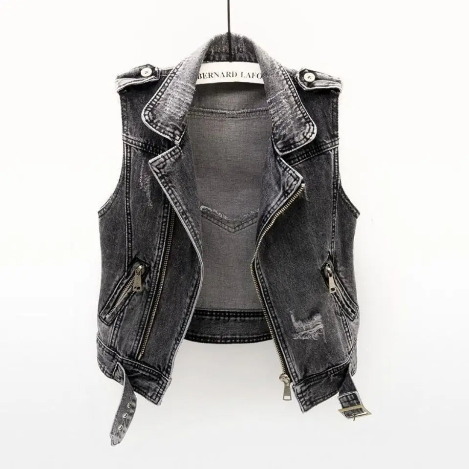 Edgy men's sleeveless denim jacket in a vintage wash, featuring an asymmetric zip & belted design.