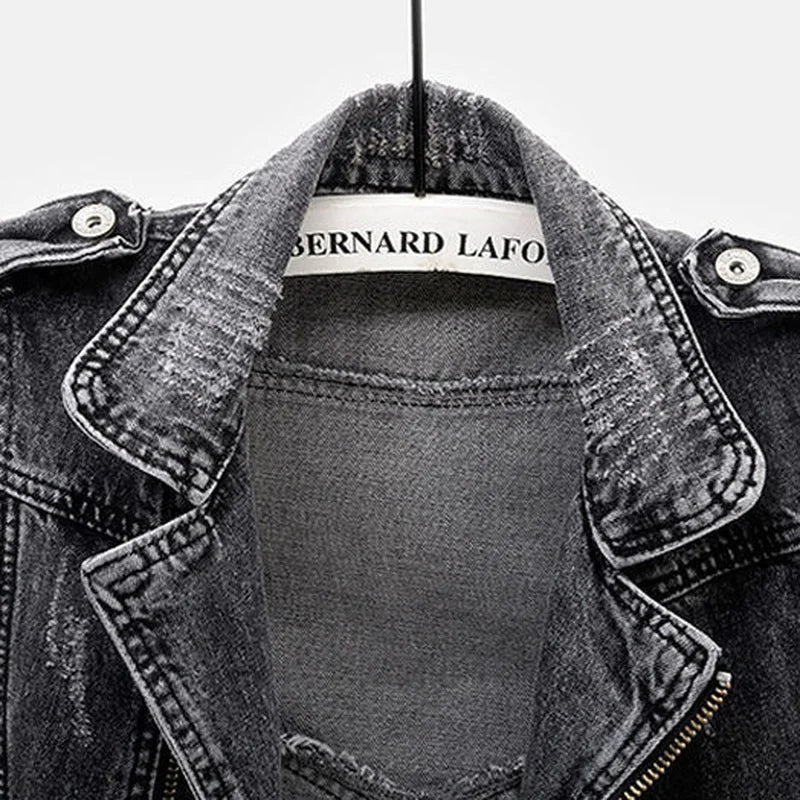 Men's distressed denim vest, perfect for layering. Asymmetric zip, belted hem, and rugged moto style.