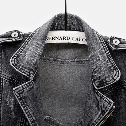 Men's distressed denim vest, perfect for layering. Asymmetric zip, belted hem, and rugged moto style.