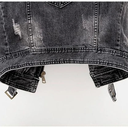 Vintage wash men's distressed denim vest with asymmetric zip, belted hem, and edgy fashion details.