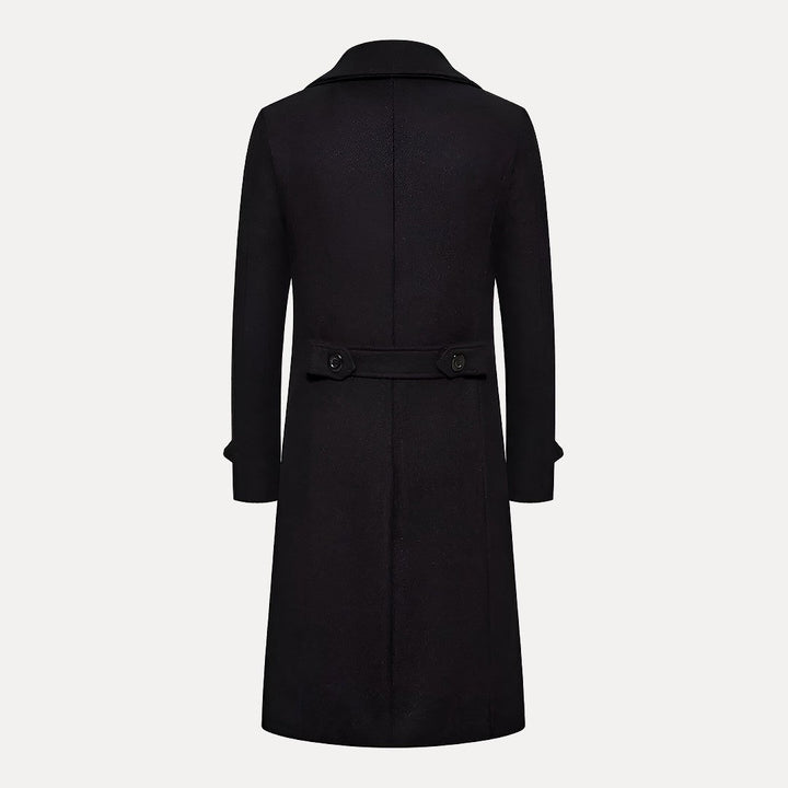 Stylish men's double-breasted long trench coat, featuring sharp peak lapels and a sophisticated fit.