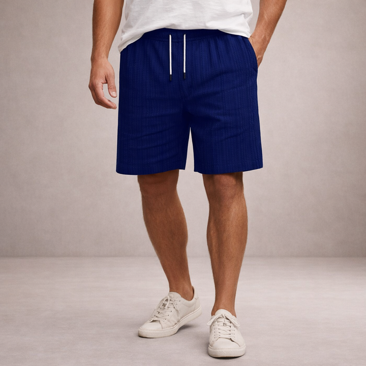 Casual men's summer shorts, relaxed fit drawstring style, ideal for warm weather and everyday comfort.