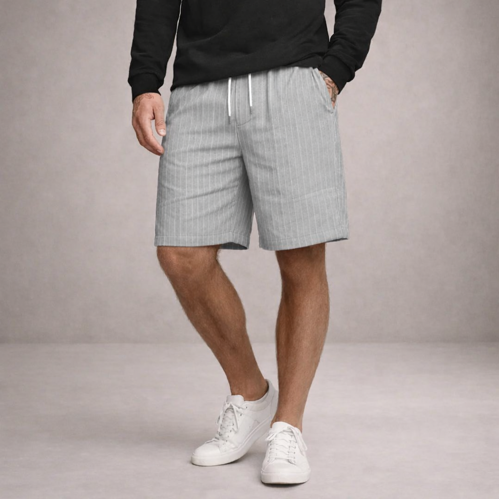 Stylish men's knee-length summer shorts, relaxed fit with drawstring, perfect for warm weather fashion.