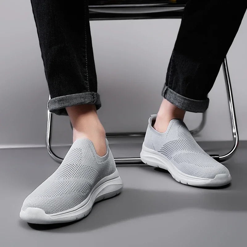 Durable, breathable knit fabric men's DriftWalk slip-on walking shoes, lightweight & comfortable.
