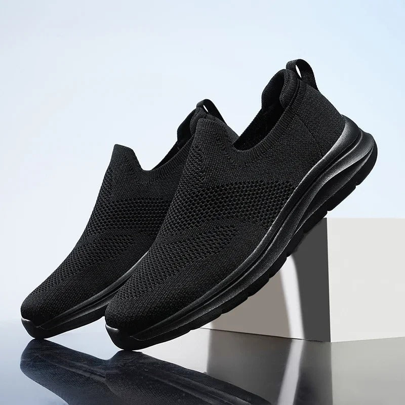 Comfortable men's DriftWalk knit slip-on sneakers, easy wear, ideal for daily walks.