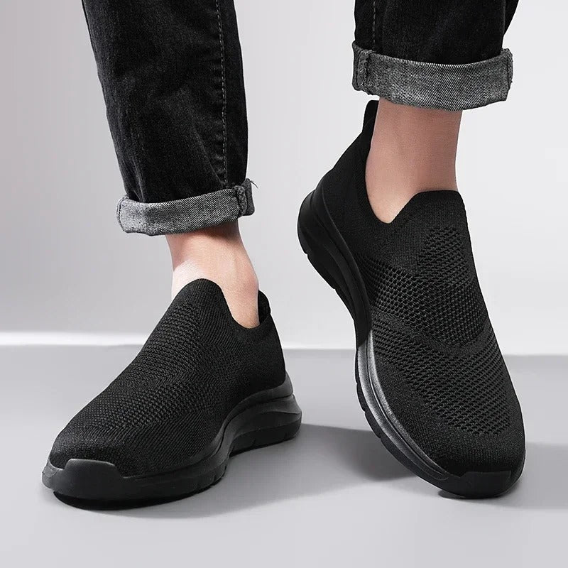 On-foot: Men's DriftWalk comfortable knit slip-on walking shoes, perfect for casual everyday wear.