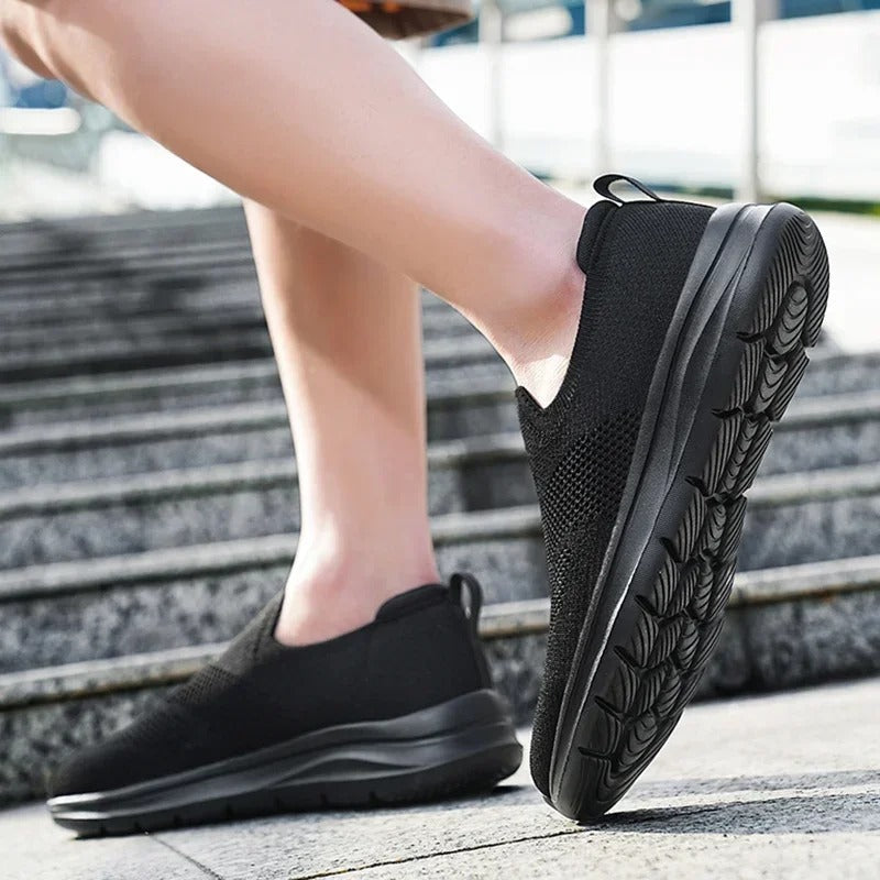 Back view: Easy wear men's DriftWalk knit slip-on sneakers, casual style & breathable comfort.