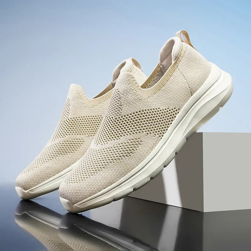 Pair of men's DriftWalk knit slip-on walking shoes, lightweight & breathable for active comfort.