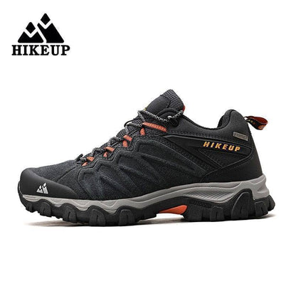 Close-up of men's leather trekking footwear, highlighting durable stitching and metal eyelets