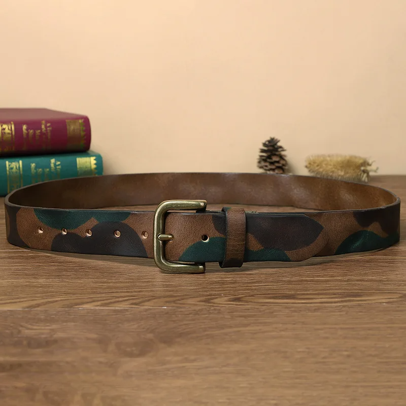 Stylish men's tactical camo belt featuring a unique pattern & strong brass buckle. Ideal for adventure.