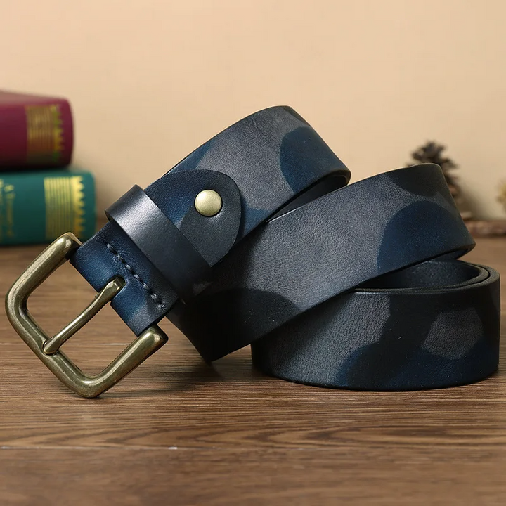 Camo pattern men's belt, a tough leather accessory with brass hardware for a rugged, stylish look.