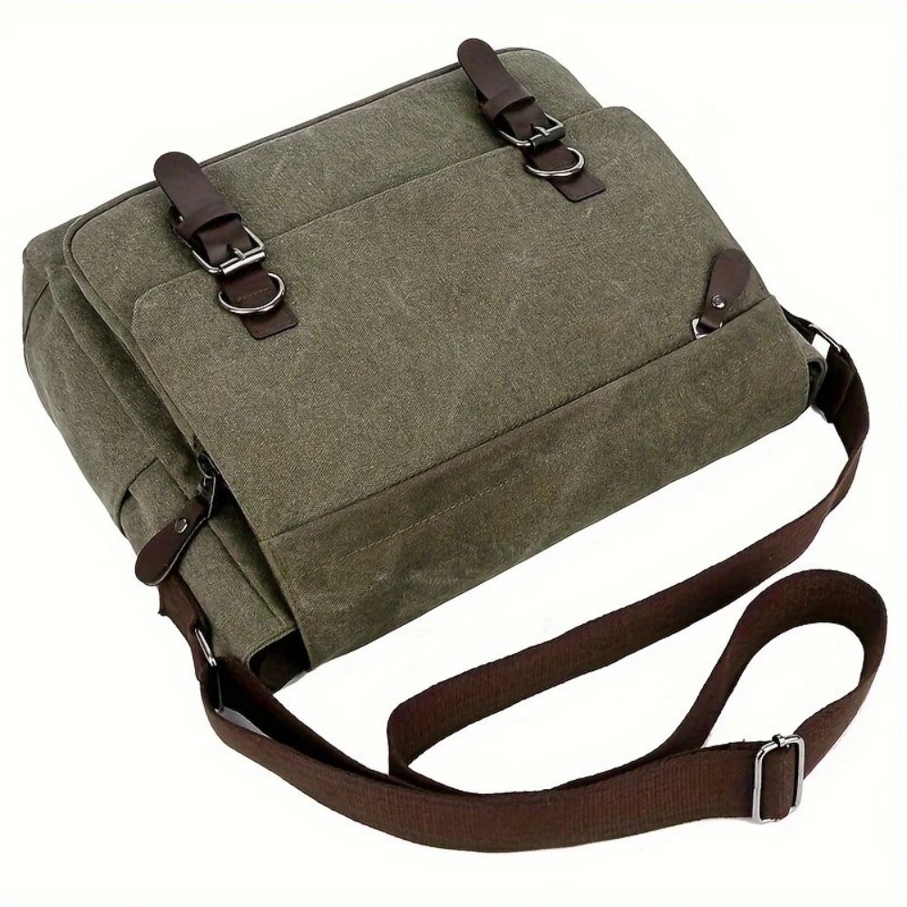 Versatile men's canvas cross-body bag. Durable messenger satchel for travel, work, & daily carry.