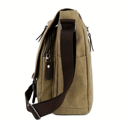 Vintage men's canvas messenger bag. Durable satchel for work, travel, & everyday necessities.