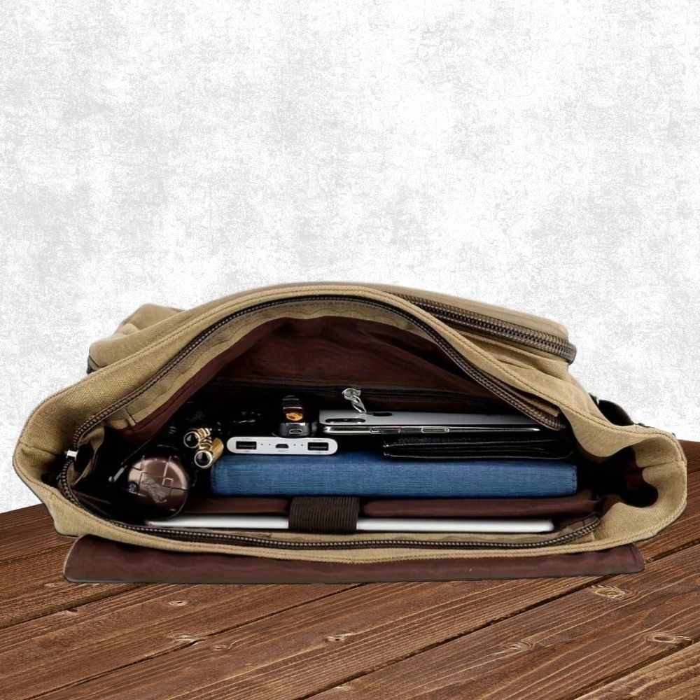 High-quality men's canvas commuter bag. Durable messenger satchel, ideal for laptops & papers.