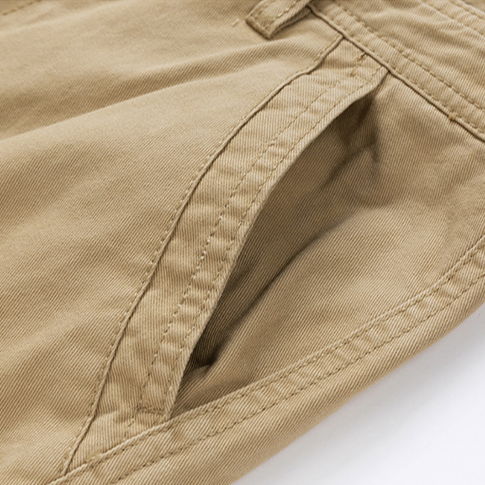 Folded men's durable cargo shorts, highlighting quality and readiness for adventure and everyday use.