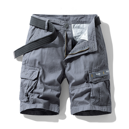 Close-up of durable fabric on men's utility cargo shorts, showcasing quality for adventure & daily wear.