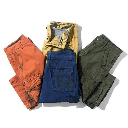 Men's durable cotton cargo shorts in olive green, ideal for hiking & outdoor activities.