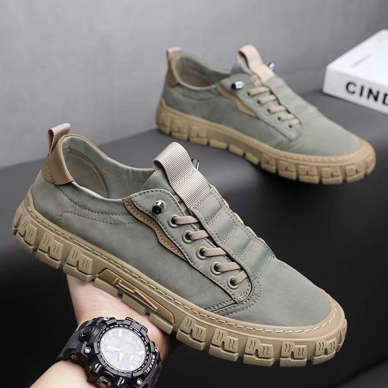 Green men's comfortable everyday sneakers, durable for walking. Versatile casual footwear for street style.