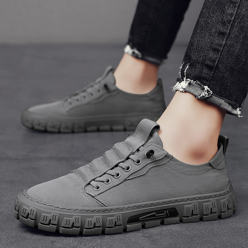 Durable men's everyday sneakers with traction, comfortable for walking & casual street style. Green, gray, or black options.