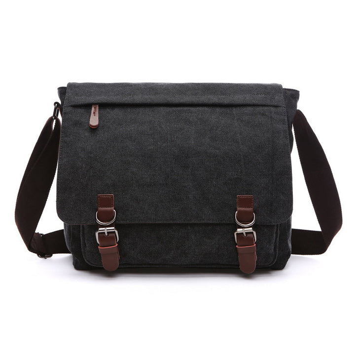 Rugged men's travel messenger bag, durable construction & secure buckle straps for adventures.