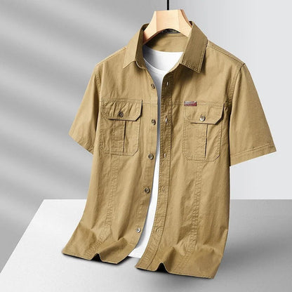 Khaki men's durable cotton short sleeve work shirt, comfortable for casual and outdoor wear.