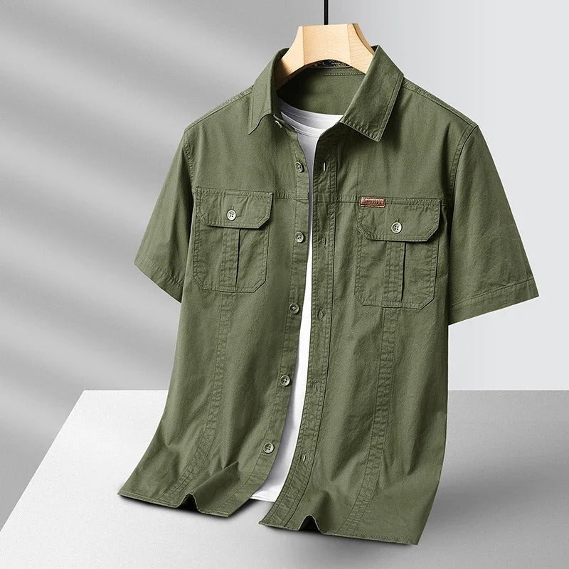 Navy blue men's durable short sleeve cotton work shirt, ideal for casual & utility tasks.