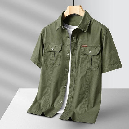 Navy blue men's durable short sleeve cotton work shirt, ideal for casual & utility tasks.