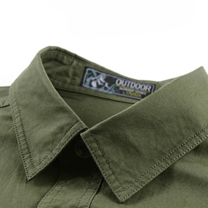 Khaki men's short sleeve cotton work shirt, durable & comfortable for outdoor wear.