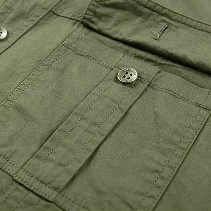 Casual khaki men's short sleeve cotton work shirt, durable & versatile for outdoor activities.