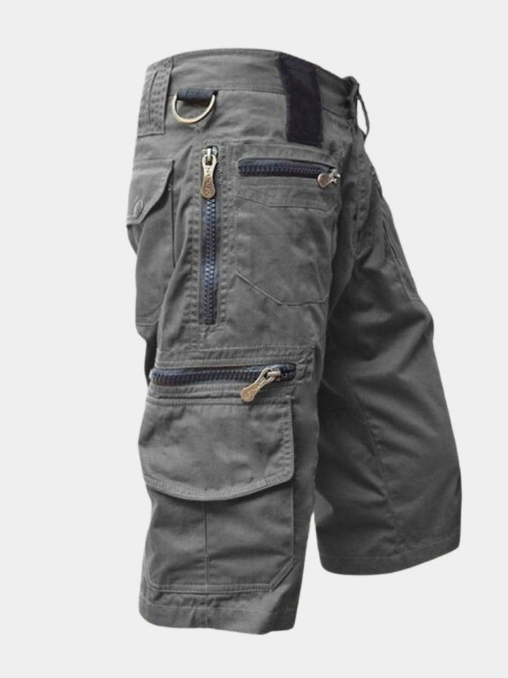 Men's durable multi-pocket cargo shorts, relaxed fit for outdoor adventures & everyday comfort. Perfect for travel.