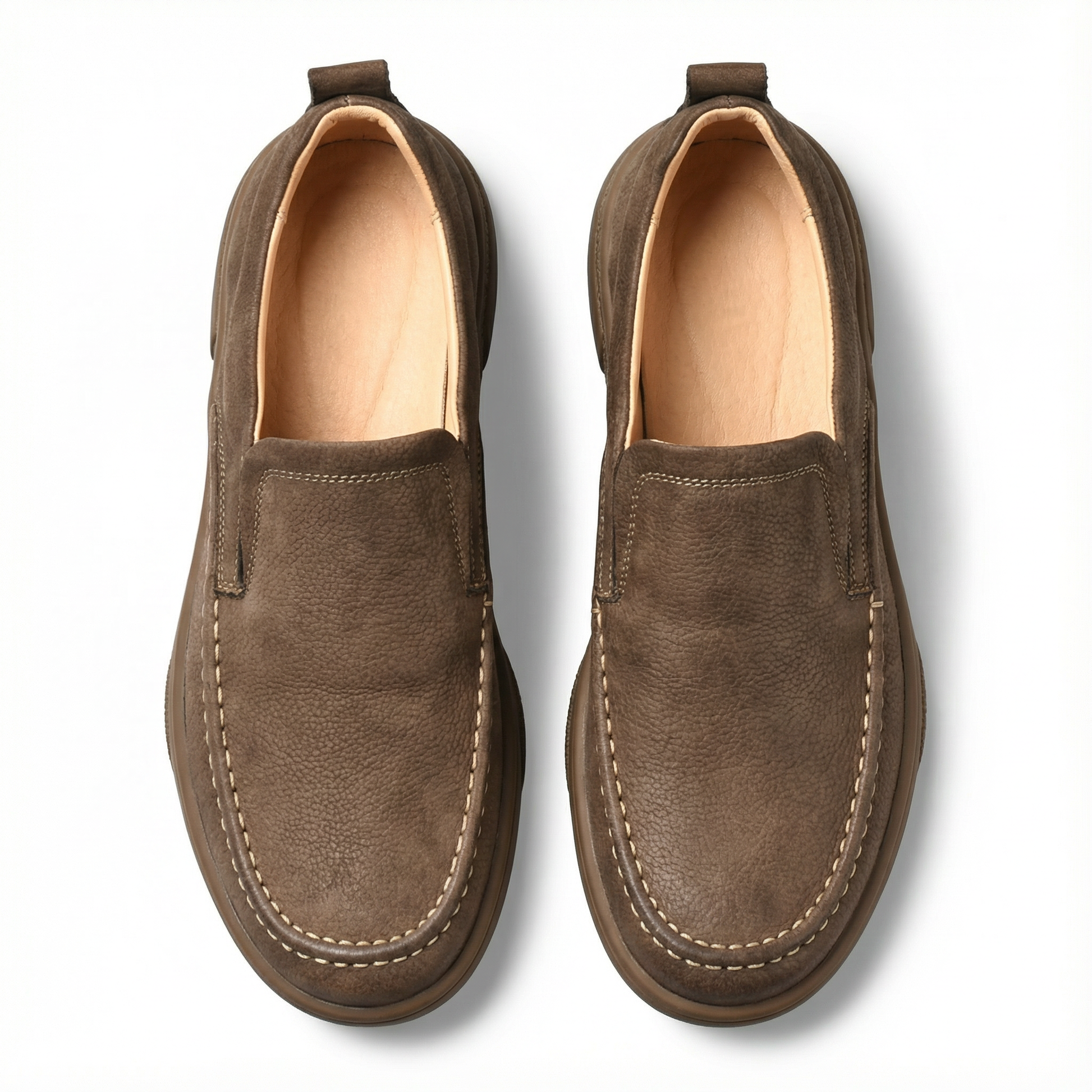 Casual men's moc-toe slip-on loafers, providing durable and comfortable footwear.