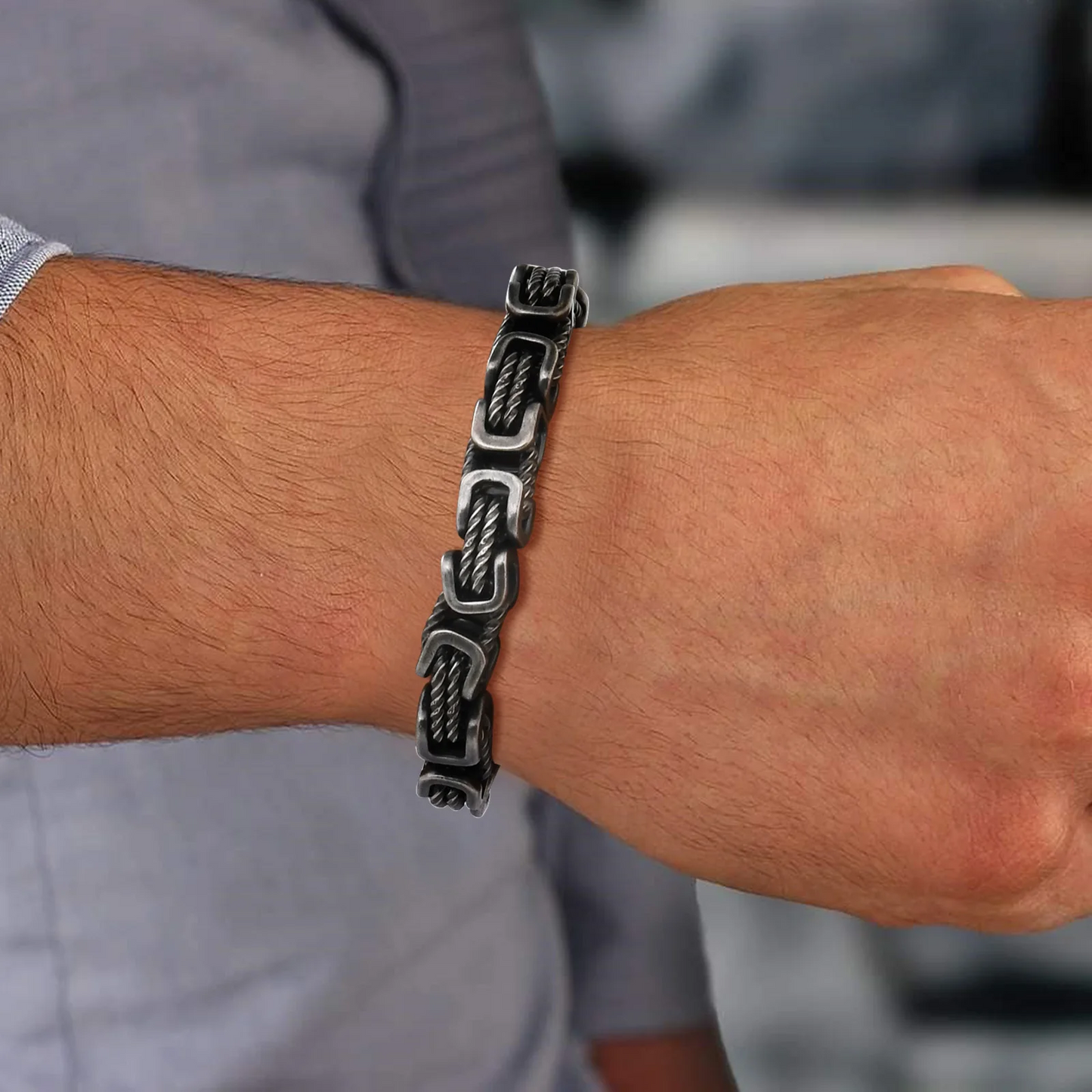 Rugged men's stainless steel chain bracelet, durable metal jewelry accessory with a polished finish.