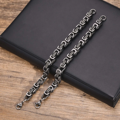 Polished stainless steel chain bracelet for men, durable and rugged accessory for any style.