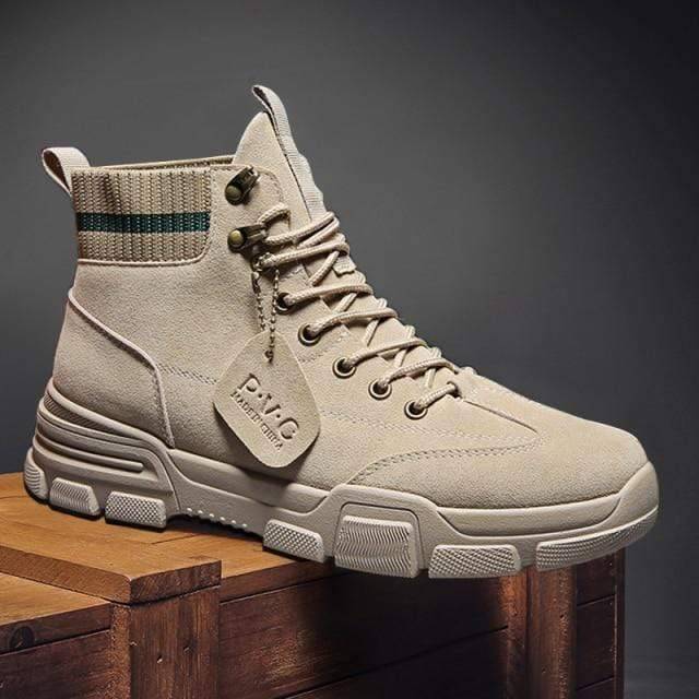 Rugged men's motorcycle boots, tan suede, offering tactical protection and durability.