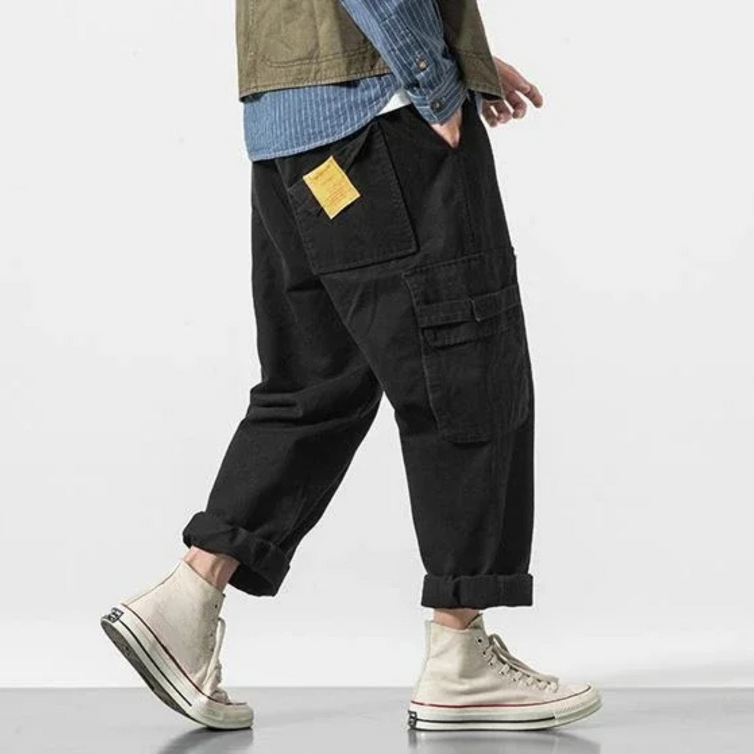 Comfortable & durable men's cotton blend cargo pants, utility style, black finish.