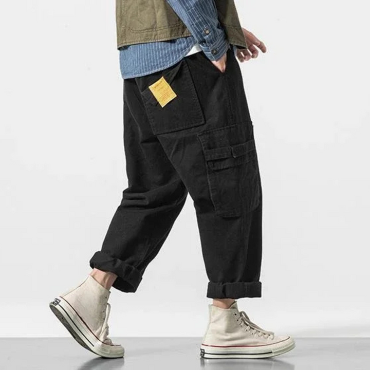 Comfortable & durable men's cotton blend cargo pants, utility style, black finish.