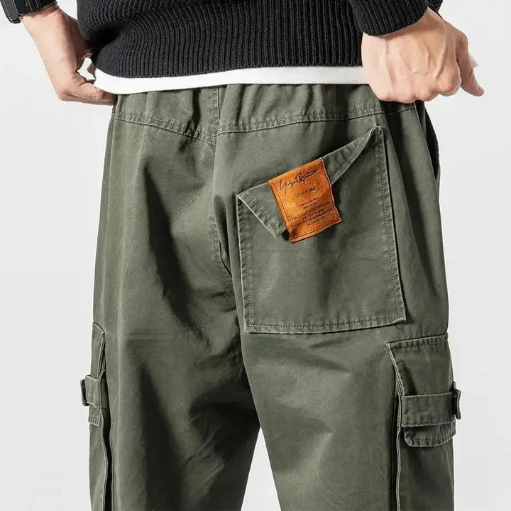 Durable cotton blend men's cargo pants, utility style, comfortable for active men.