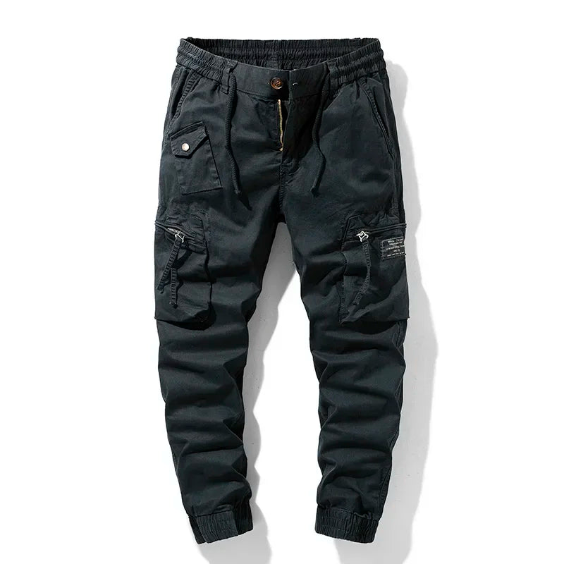 Khaki men's durable utility cargo pants with secure multi-pocket design, perfect for tactical & work use.