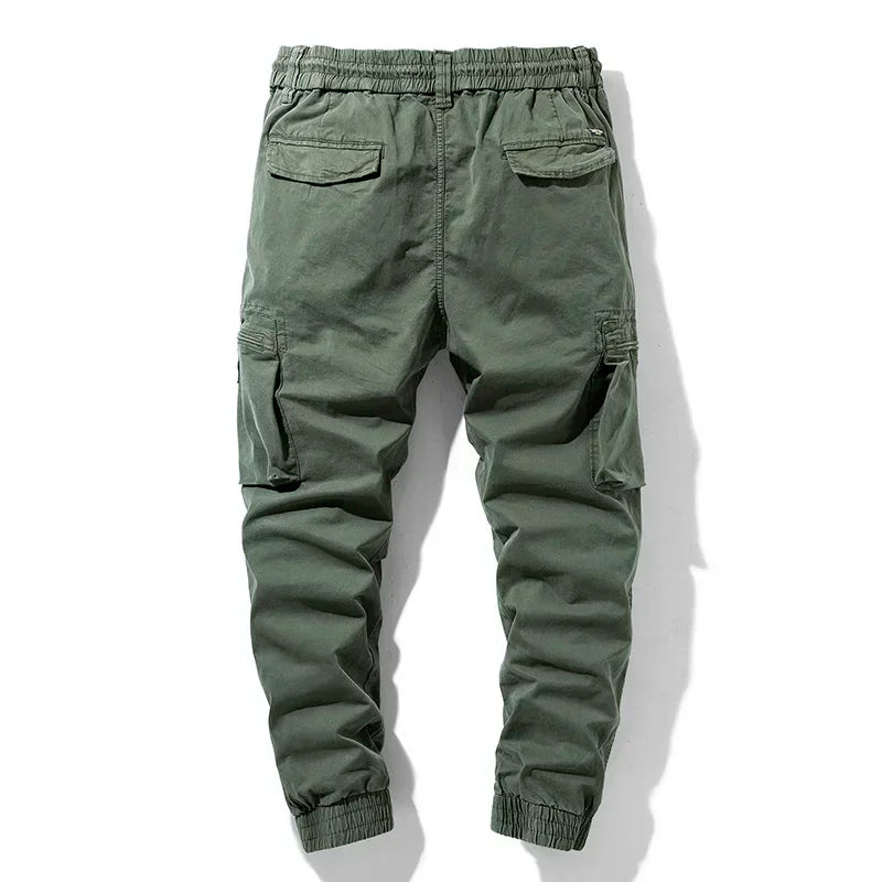 Rugged men's utility cargo pants featuring secure multi-pockets, built for durability in work & outdoor settings.