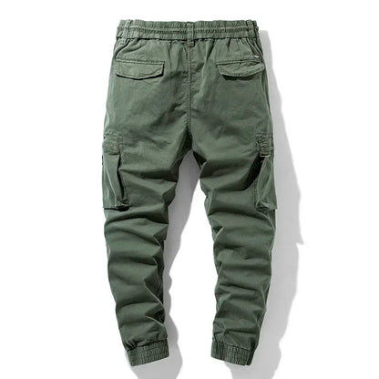 Rugged men's utility cargo pants featuring secure multi-pockets, built for durability in work & outdoor settings.