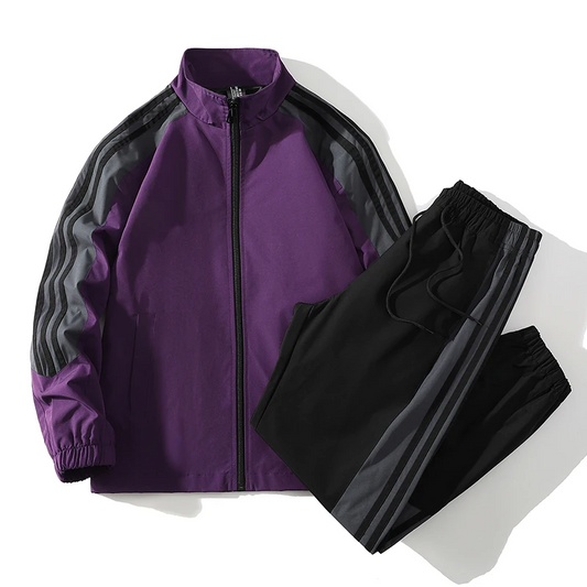 Men's dynamic color-block tracksuit set with zip-up jacket & joggers, ideal for activewear & sportswear.