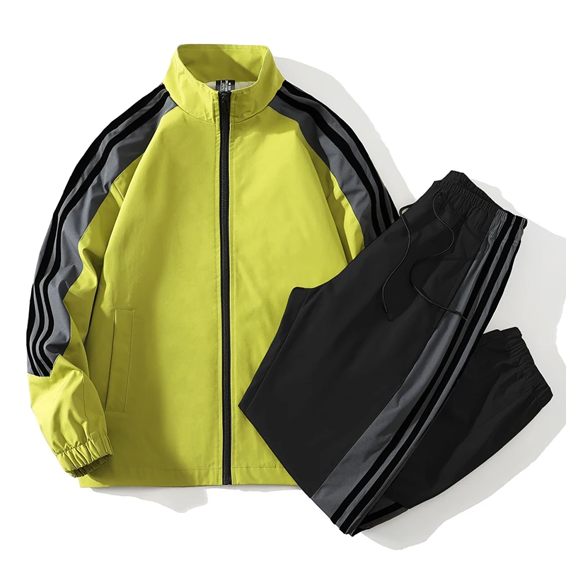 Comfortable men's color-block active tracksuit set. Stylish zip-up jacket & jogger pants for athletic or casual wear.
