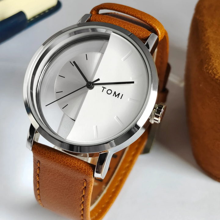 Man wearing a modern Eclipse half-dial analog watch with a stylish leather band.