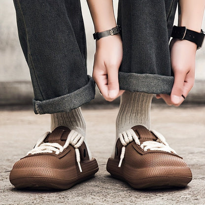 Water-friendly Eclipse laced clogs for men. Durable slip-on casual footwear, great for beach or pool.