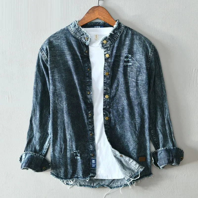 Edgy men's light blue collarless button-down shirt. A casual, modern top with a unique, fashionable design.