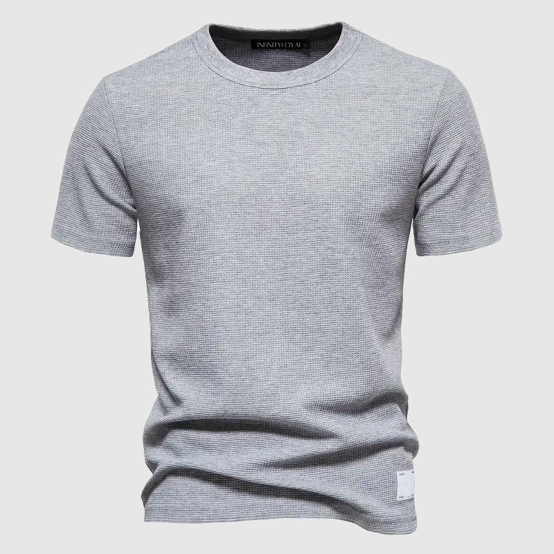 Stylish men's casual tee with a modern fit, perfect for refined summer fashion and comfort.