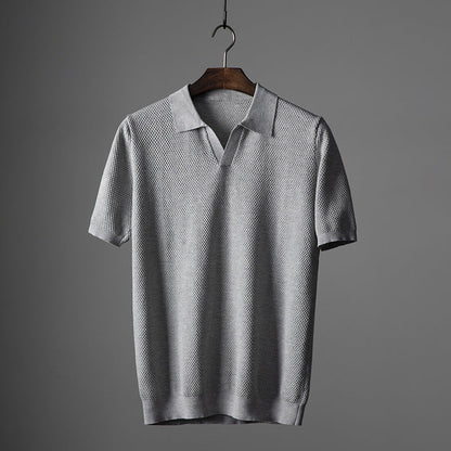 Dark blue men's smart casual knit polo shirt, ideal for everyday style.